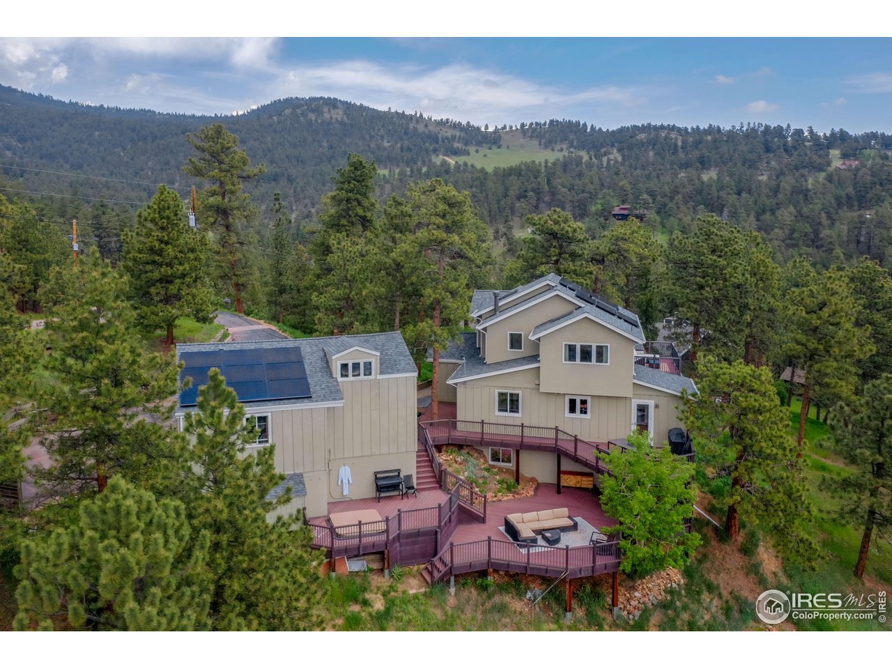 an aerial view of a house with a garden