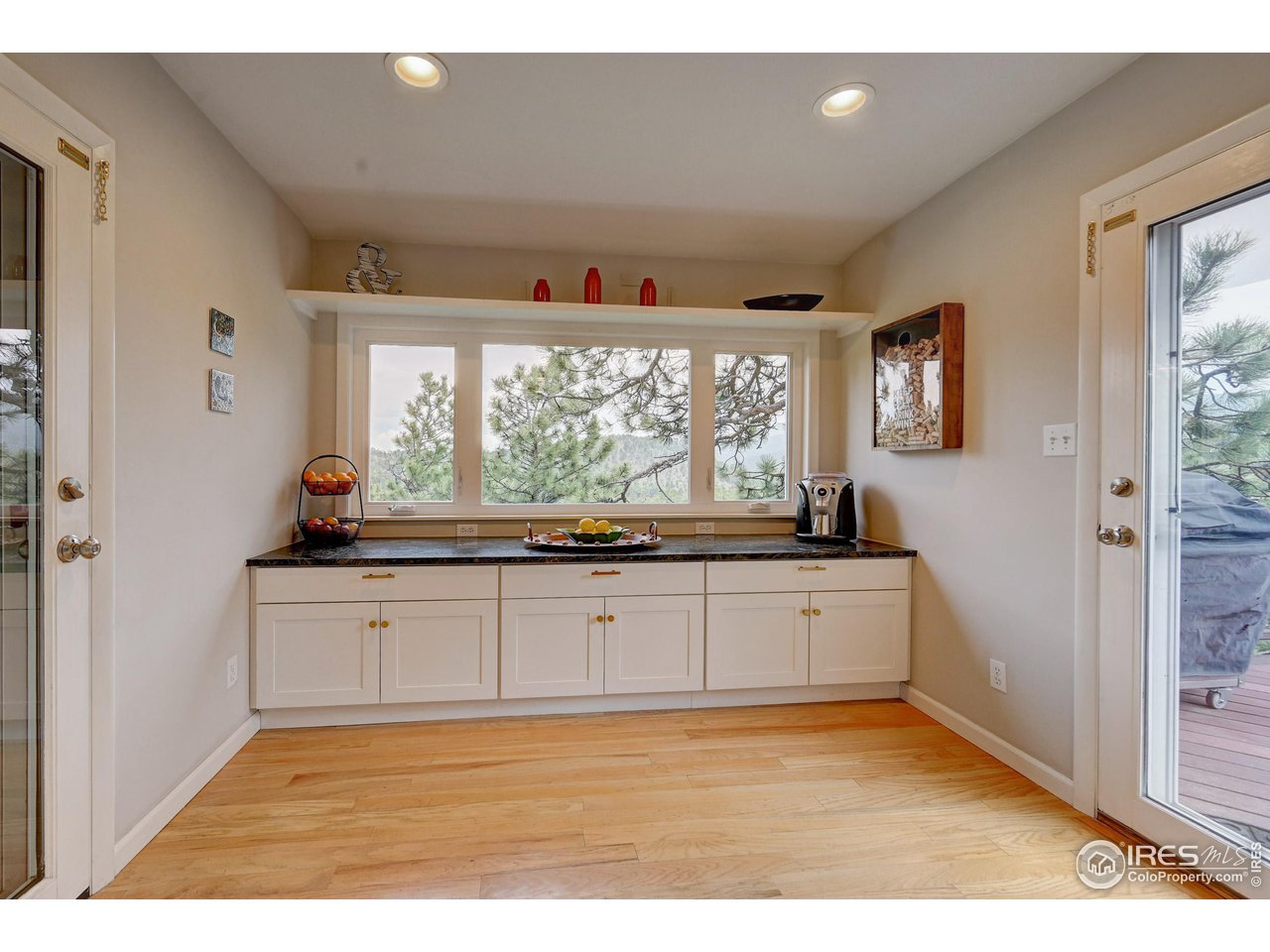 924 West Kelly Road West Boulder, CO 80302 - Photo 11 of 37 a kitchen with stainless steel appliances granite countertop a stove a sink and a refrigerator