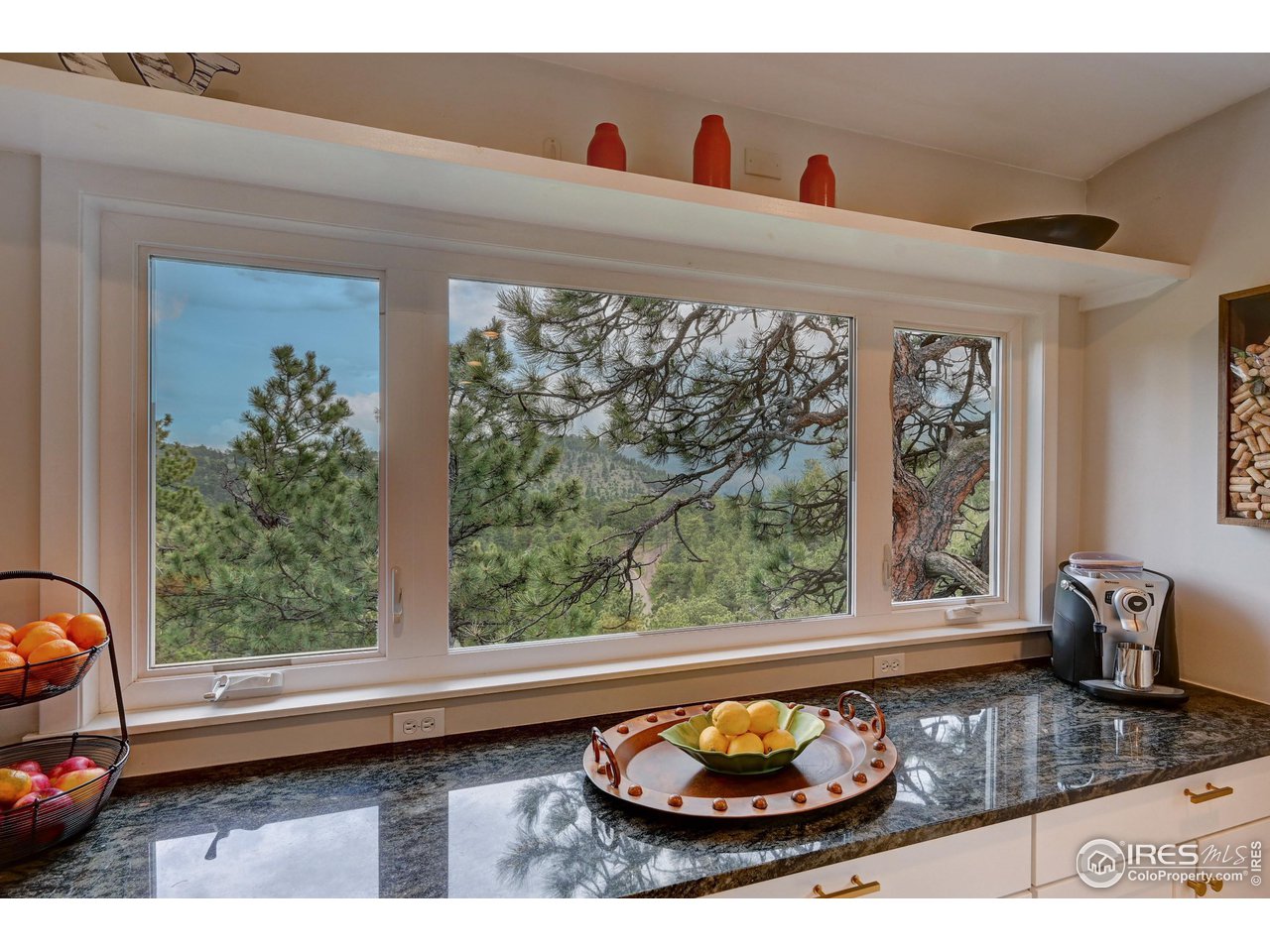 924 West Kelly Road West Boulder, CO 80302 - Photo 12 of 37 a living room with furniture and a window