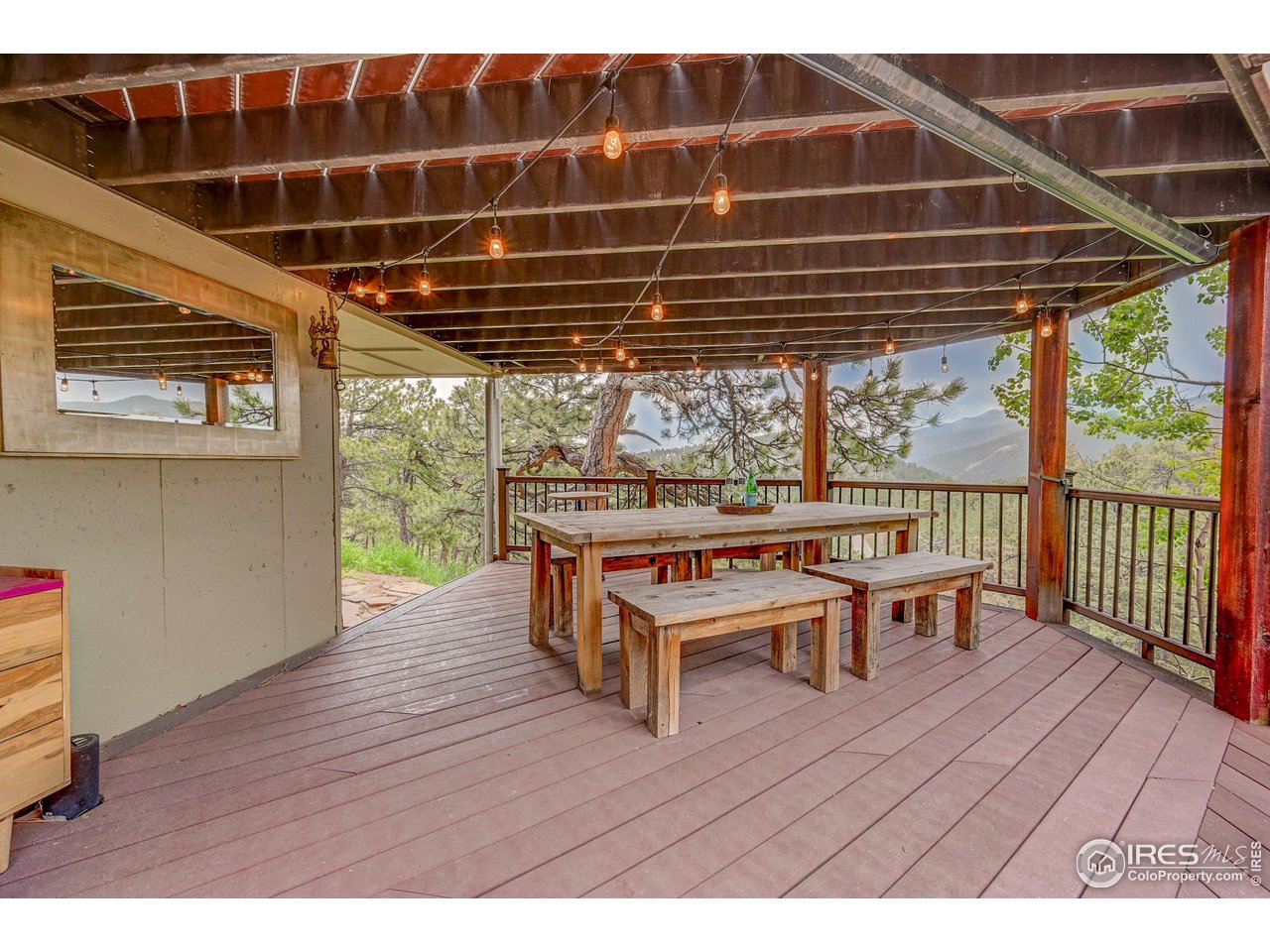 924 West Kelly Road West Boulder, CO 80302 - Photo 31 of 37 a view of a chairs and table on the wooden floor