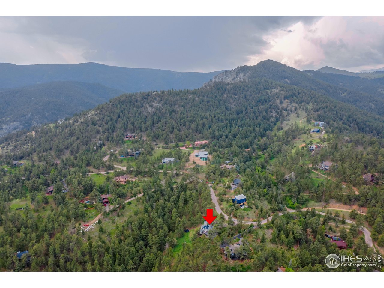 924 West Kelly Road West Boulder, CO 80302 - Photo 35 of 37 a view of a lush green hillside and a mountain