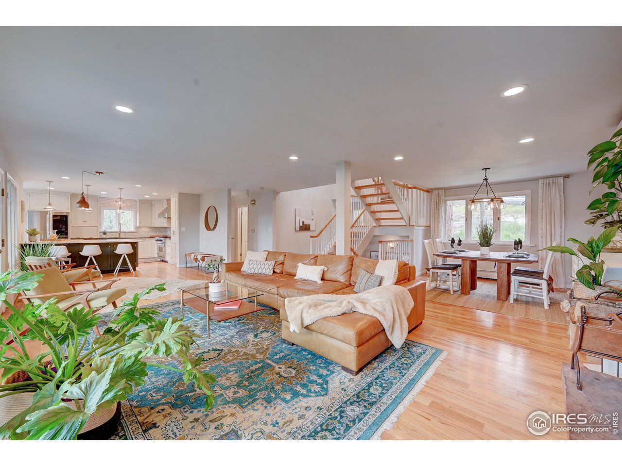 924 West Kelly Road West Boulder, CO 80302 - Photo 5 of 37 a living room with lots of furniture and a view of kitchen