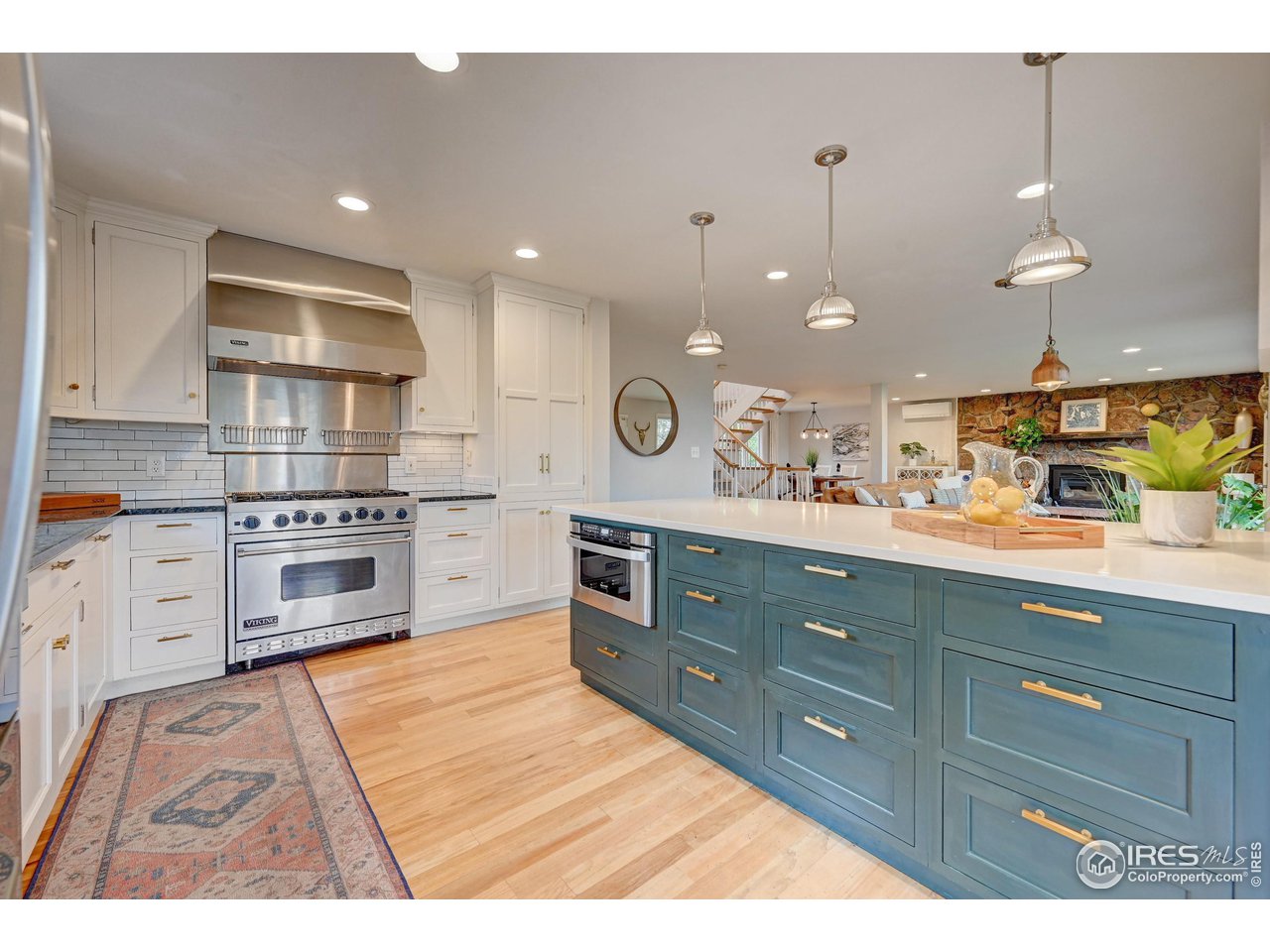 924 West Kelly Road West Boulder, CO 80302 - Photo 9 of 37 a kitchen with a sink stainless steel appliances and cabinets