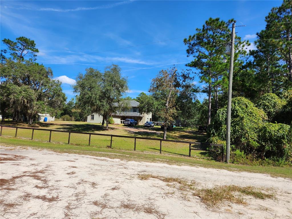 6 Southwest 121st Terrace Ocala, FL 34481 - Photo 1 of 1 house on the left ( north ) side