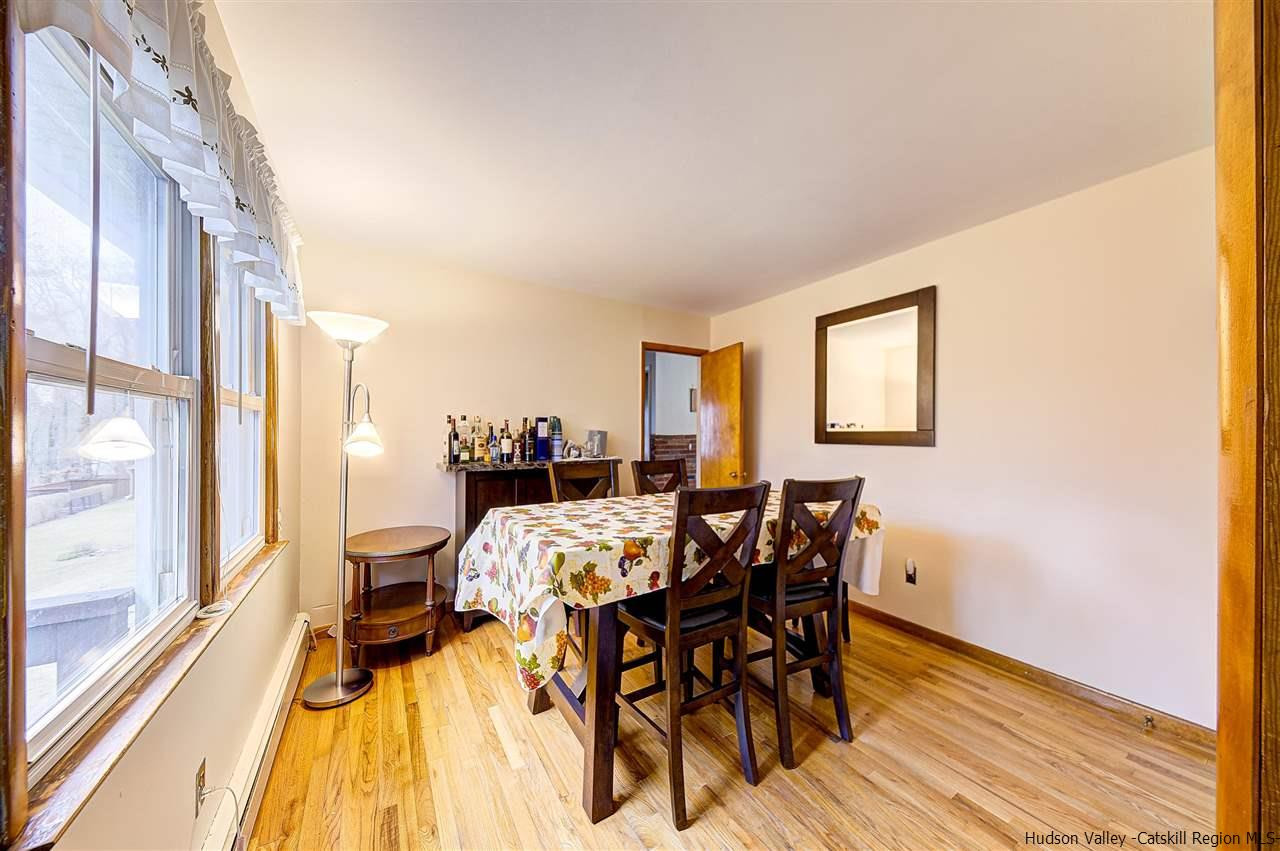 105 Gleneida Ridge Road Carmel, NY 10512 - Photo 11 of 35 a view of a dining room with furniture and a window