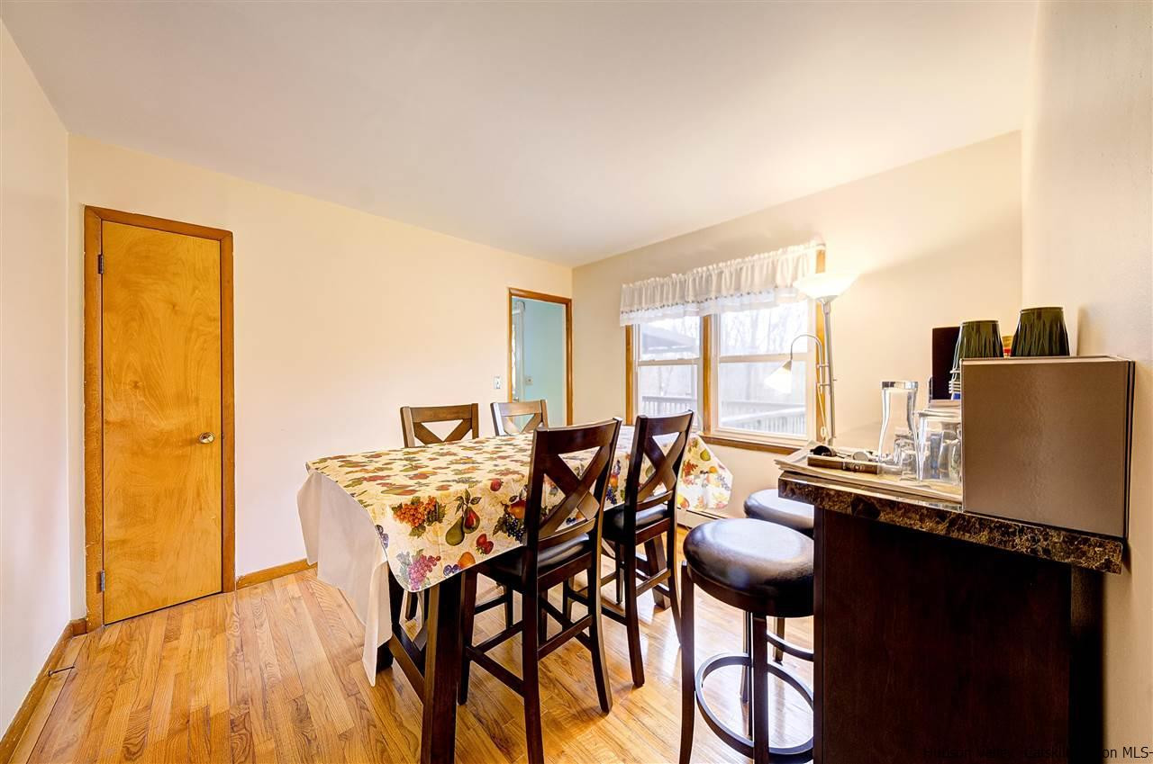 105 Gleneida Ridge Road Carmel, NY 10512 - Photo 12 of 35 a view of a dining room with furniture and a window