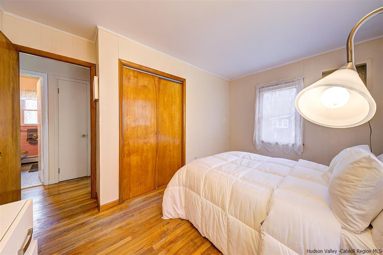 105 Gleneida Ridge Road Carmel, NY 10512 - Photo 22 of 35 a bedroom with a bed and a window