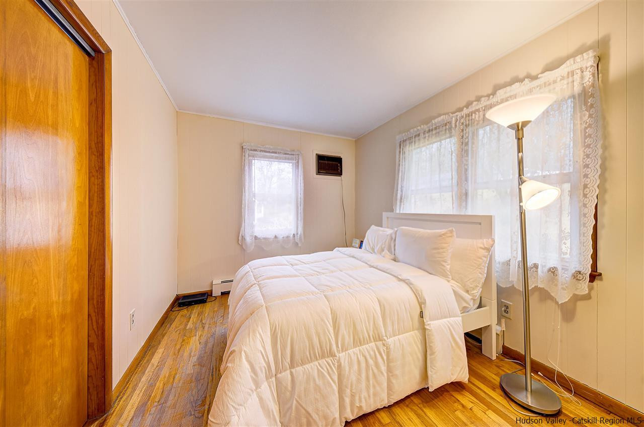 105 Gleneida Ridge Road Carmel, NY 10512 - Photo 23 of 35 a bedroom with a bed and a window