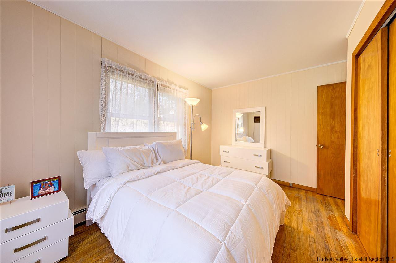 105 Gleneida Ridge Road Carmel, NY 10512 - Photo 24 of 35 a bedroom with a bed and a window