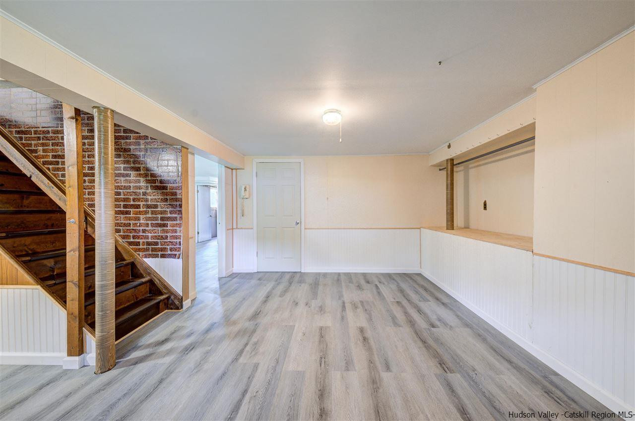 105 Gleneida Ridge Road Carmel, NY 10512 - Photo 29 of 35 wooden floor in an empty room with a window