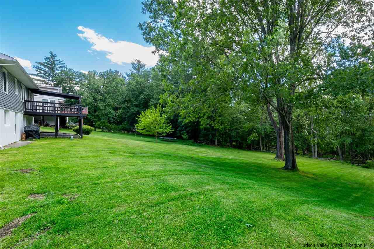105 Gleneida Ridge Road Carmel, NY 10512 - Photo 32 of 35 a view of a big yard with a house