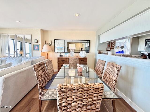 3949 Ocean Drive Oxnard, CA 93035 - Photo 15 of 24 a living room with furniture and a wooden floor