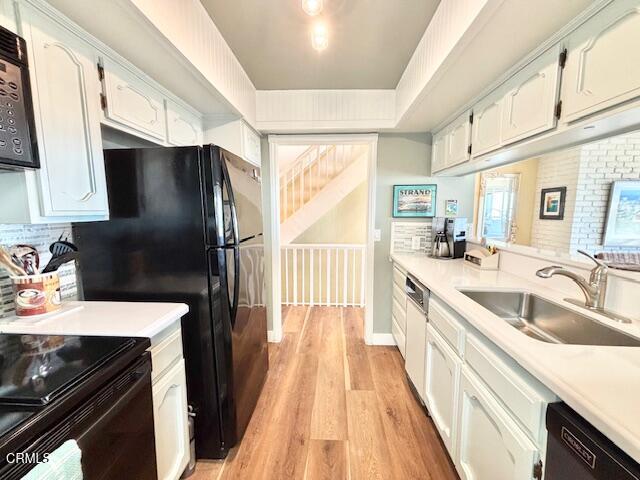 3949 Ocean Drive Oxnard, CA 93035 - Photo 17 of 24 a kitchen with stainless steel appliances granite countertop a sink stove and refrigerator