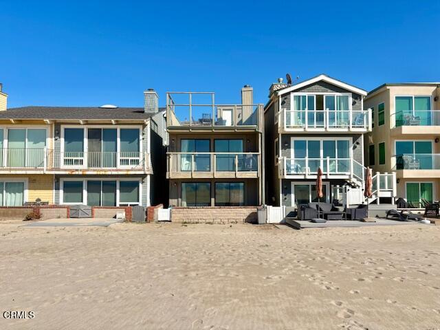 3949 Ocean Drive Oxnard, CA 93035 - Photo 2 of 24 a front view of a building with street view