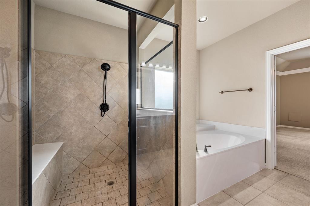 282 Heather Lane Decatur, TX 76234 - Photo 20 of 36 a bathroom with a bathtub and shower