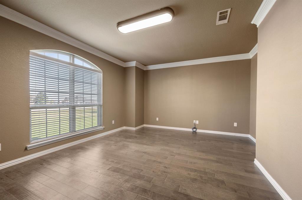 282 Heather Lane Decatur, TX 76234 - Photo 21 of 36 a view of an empty room with a window