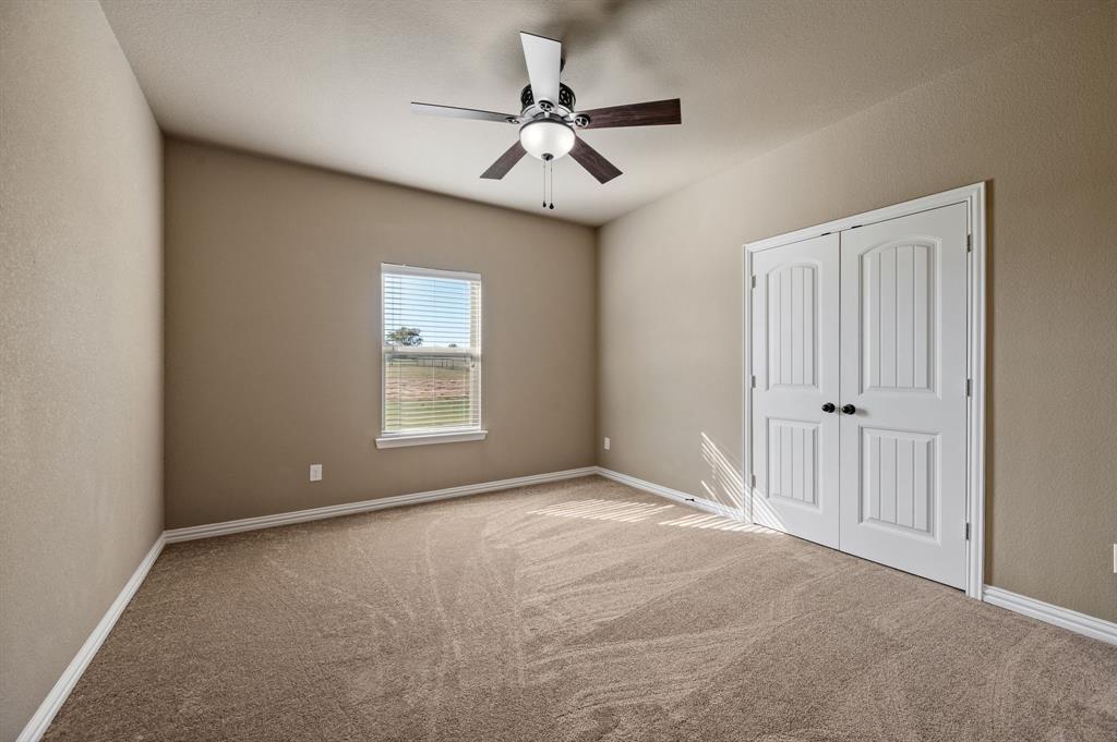 282 Heather Lane Decatur, TX 76234 - Photo 24 of 36 a view of an empty room with a window