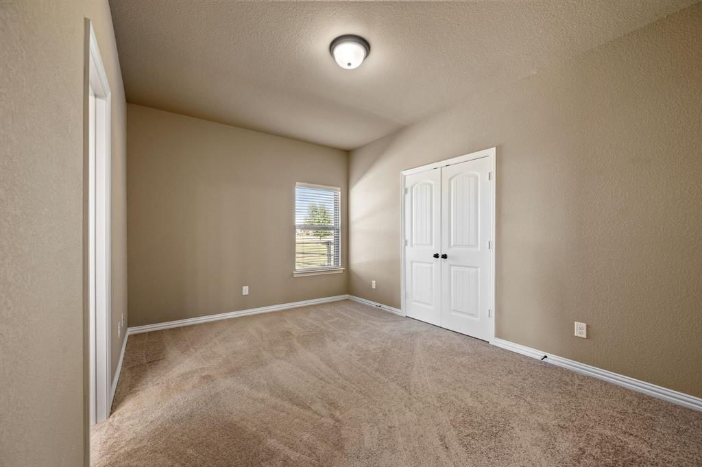 282 Heather Lane Decatur, TX 76234 - Photo 26 of 36 a view of an empty room with a window
