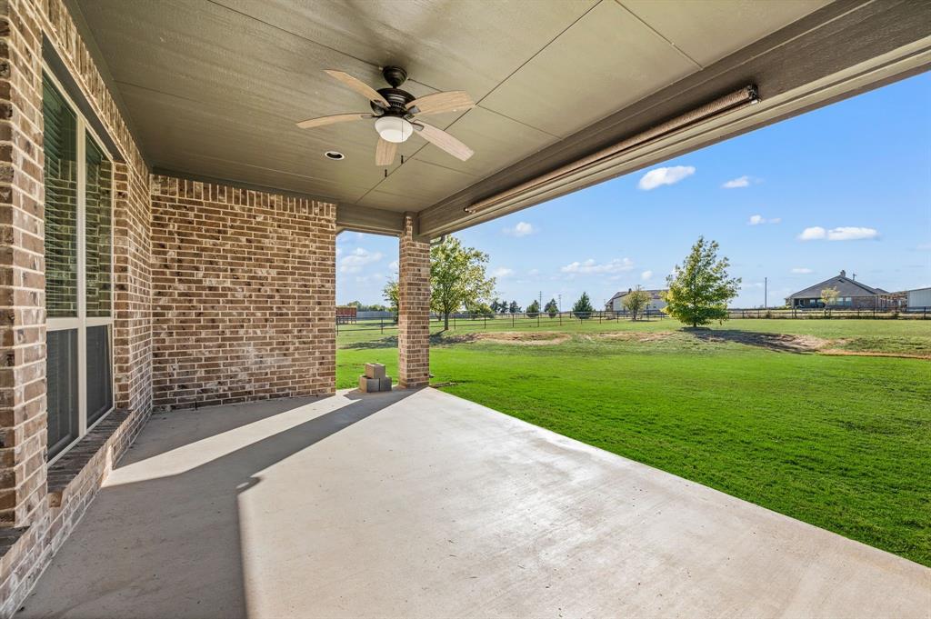 282 Heather Lane Decatur, TX 76234 - Photo 28 of 36 a view of a porch with a garden