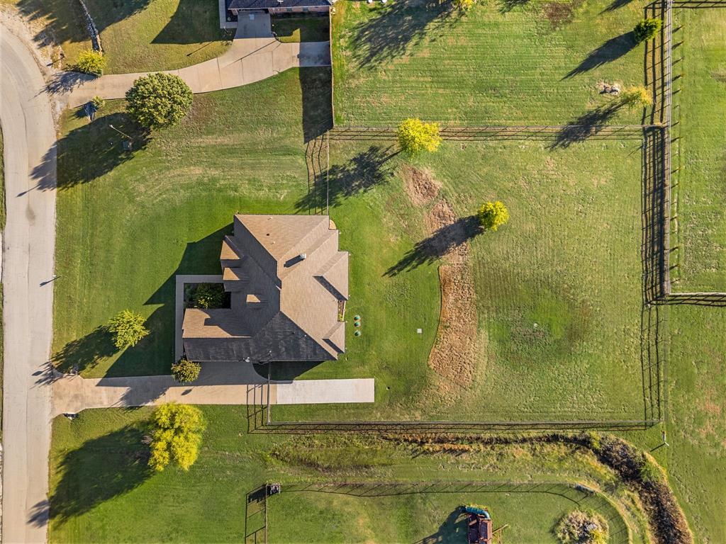 282 Heather Lane Decatur, TX 76234 - Photo 33 of 36 an aerial view of a house with a swimming pool