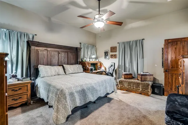 a bedroom with a bed and furniture