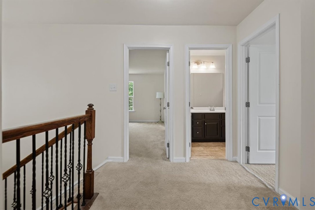 9013 Bailey Hill Road Midlothian, VA 23112 - Photo 33 of 56 Upper-level landing featuring neutral carpeting an