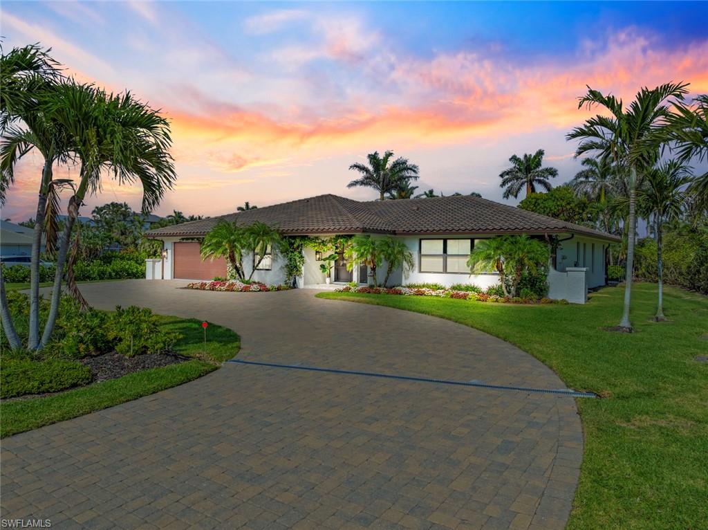 4222 Crayton Road Naples, FL 34103 - Photo 1 of 46