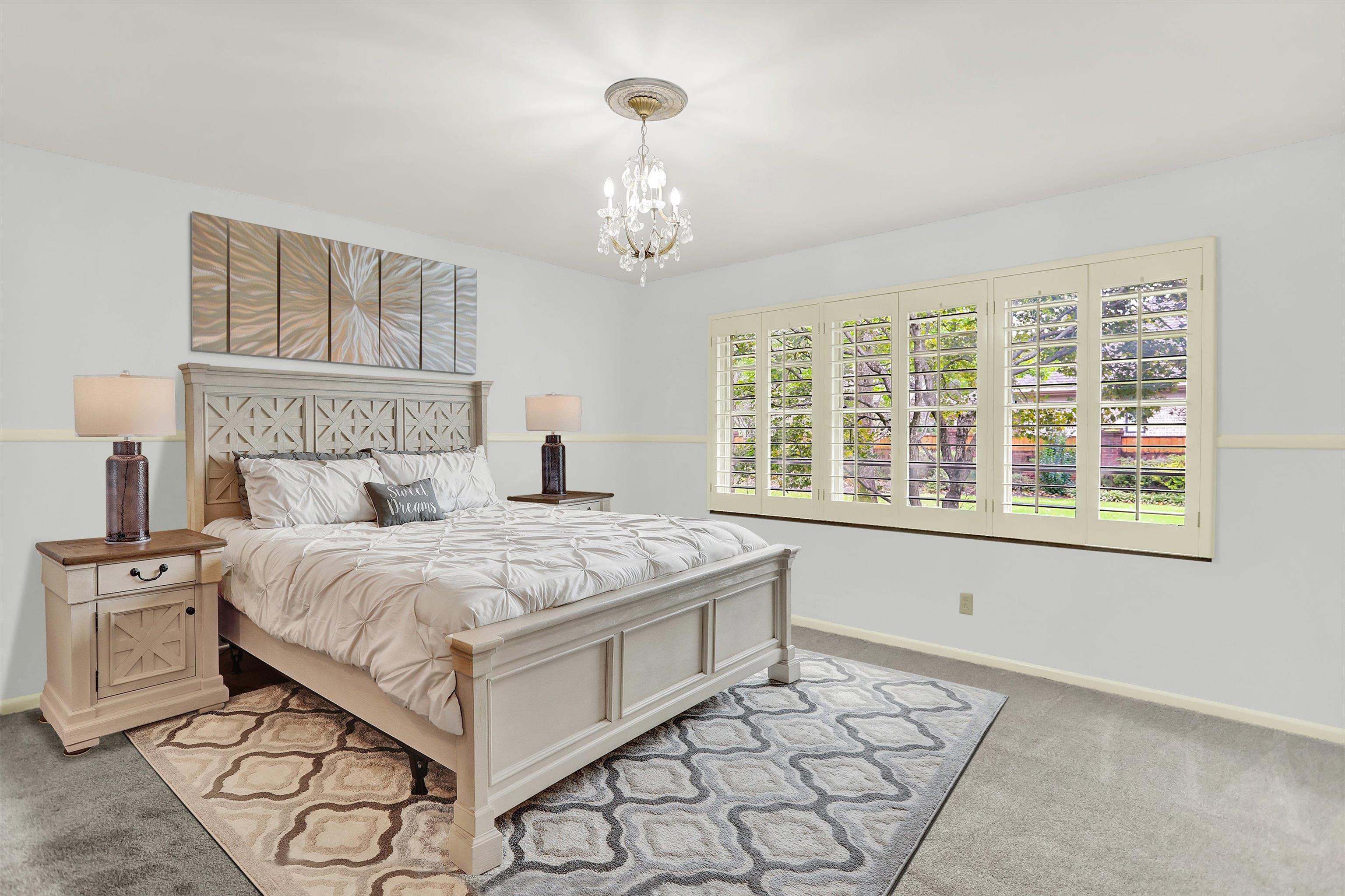280 Waring Road Memphis, TN 38117 - Photo 27 of 38 a bedroom with a large bed and a window