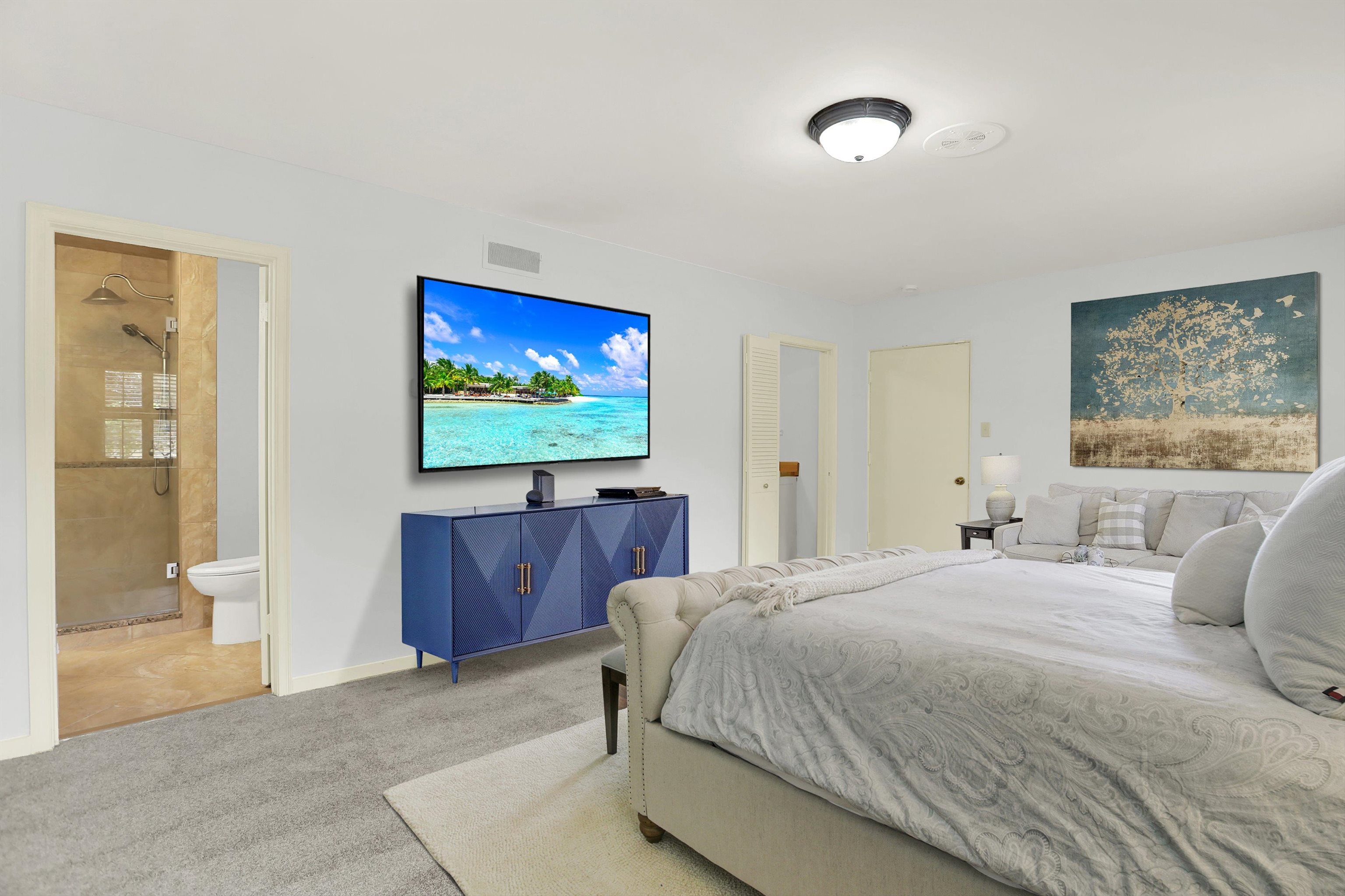 280 Waring Road Memphis, TN 38117 - Photo 36 of 38 a bedroom with a bed and a flat screen tv