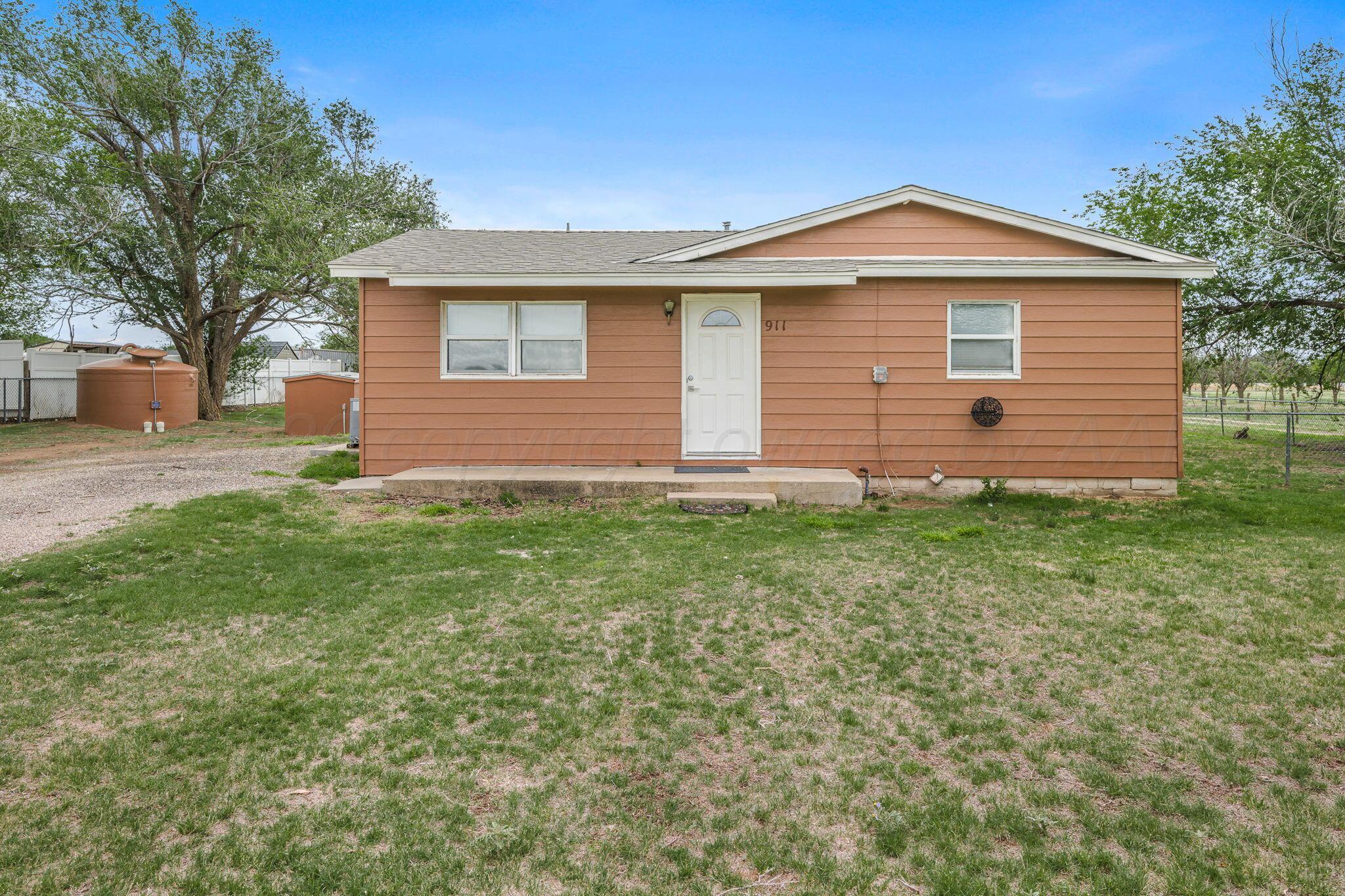 911 West 3rd Street Canyon, TX 79015 - Photo 1 of 18 Front