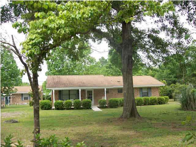 4241 Schifko Road Cantonment, FL 32533 - Photo 1 of 21 Beautiful property just off of Hwy 196, Barrineau Park Road. Main house with guest house to the left.