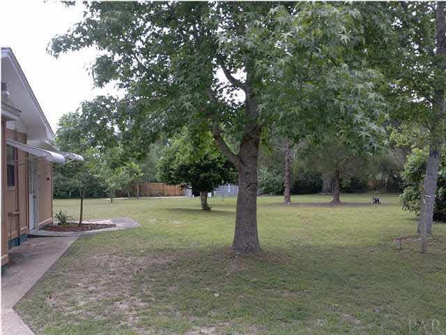 4241 Schifko Road Cantonment, FL 32533 - Photo 16 of 21 other side of cottage toward the barn, closer to house
