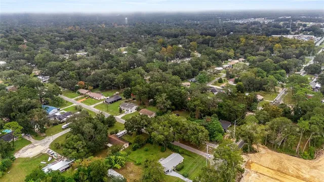a house with trees in the background