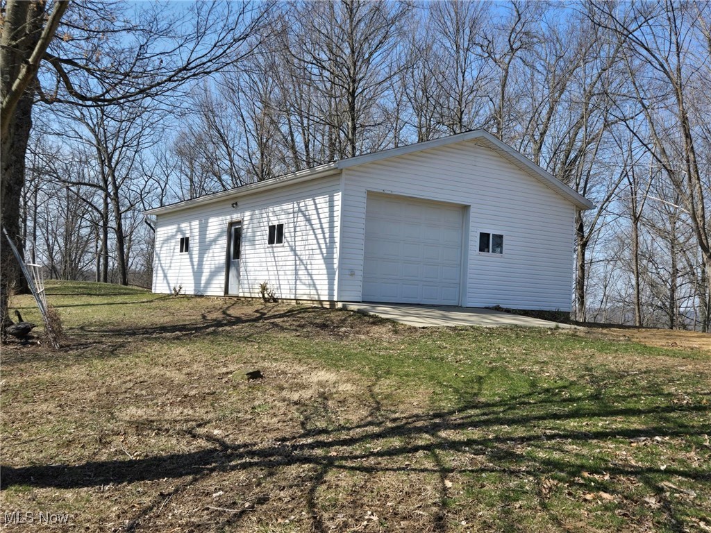 6376 Nichols Road Malta, OH 43758 - Photo 16 of 23 Detached garage featuring driveway