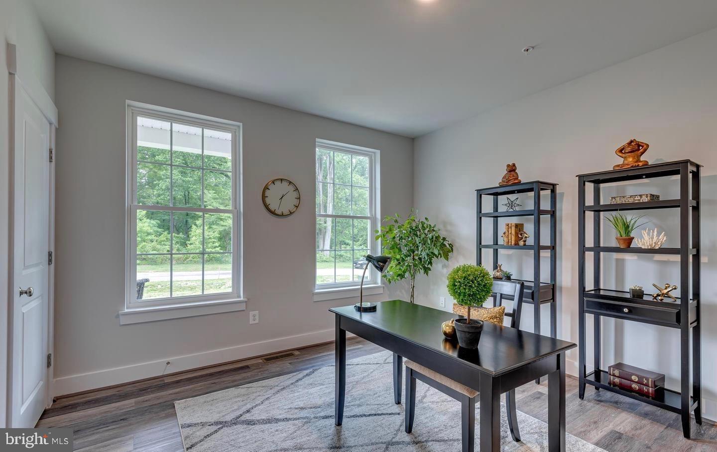 6709 Deep Run Trail Hanover, MD 21076 - Photo 6 of 12 a work room with furniture and a window