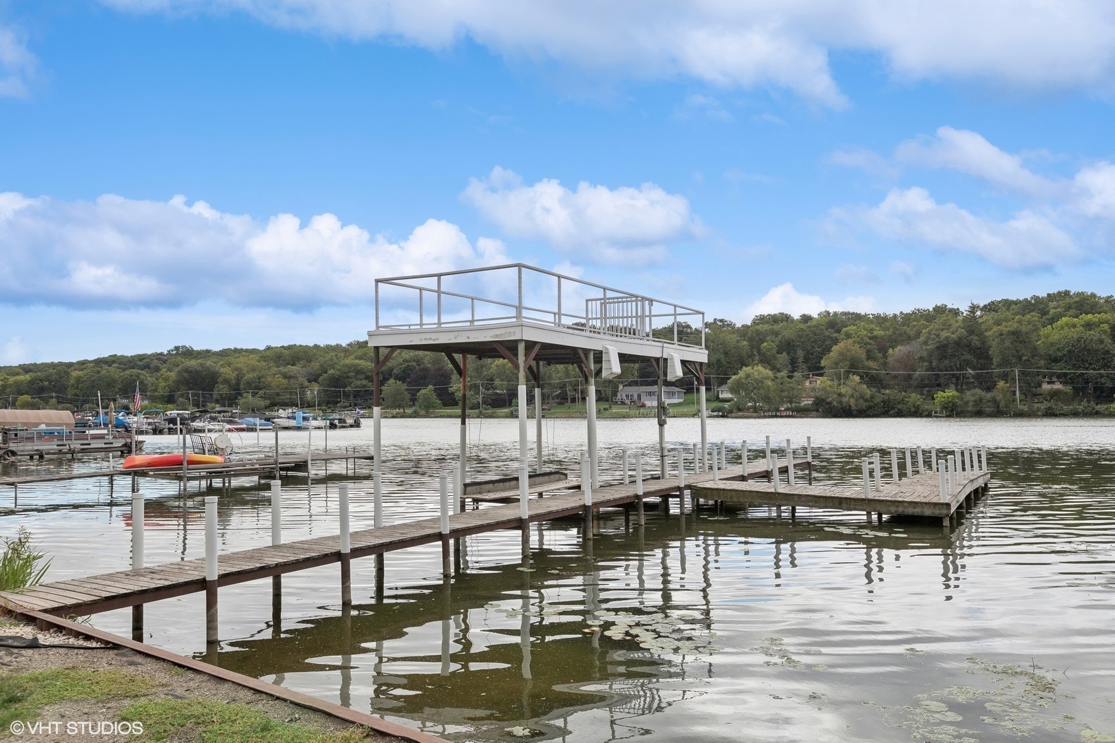 701 North Harrison Street Algonquin, IL 60102 - Photo 23 of 28 a view of a lake with sitting area