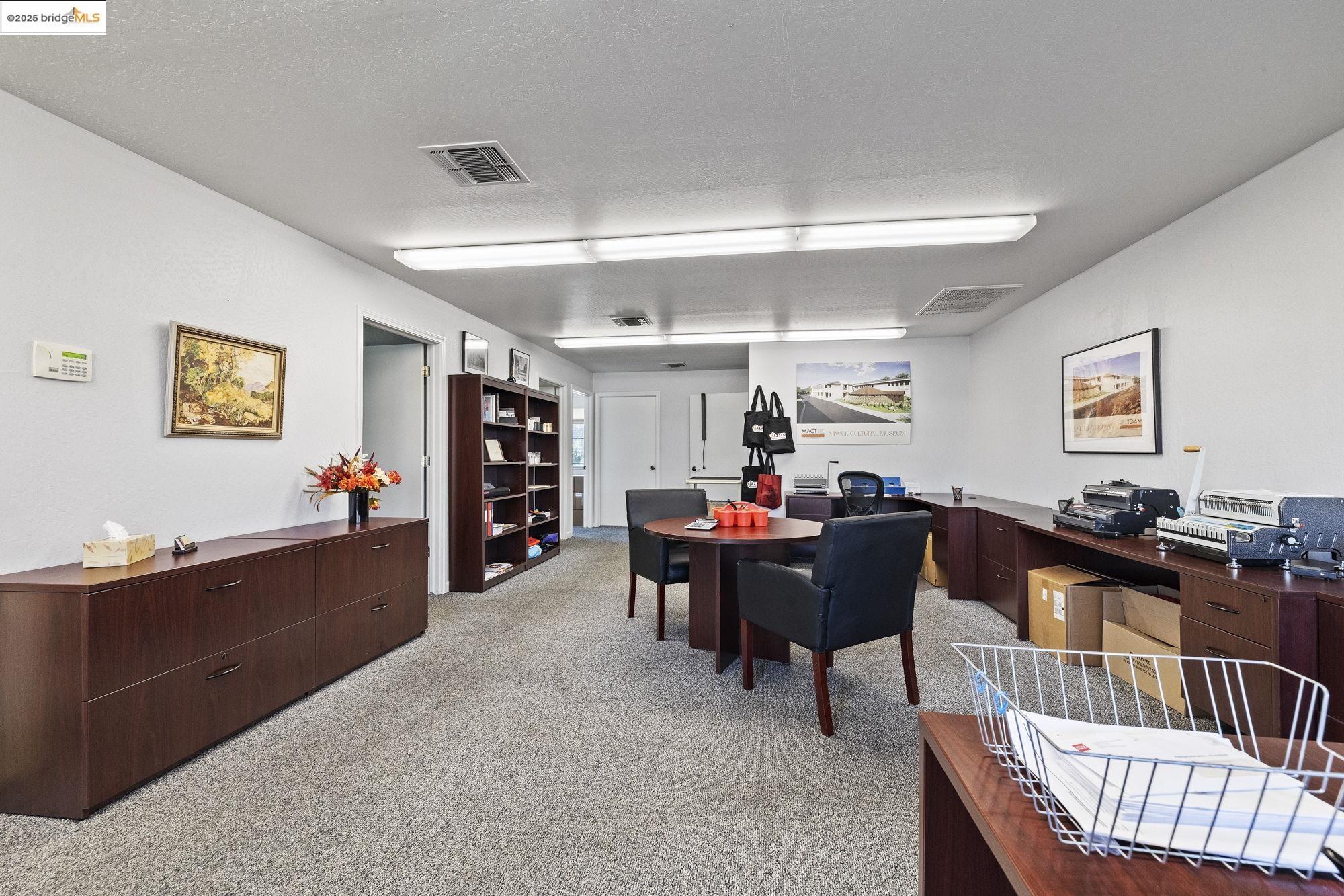 21663 Brian Lane Sonora, CA 95370 - Photo 2 of 9 a living room with furniture and a flat screen tv