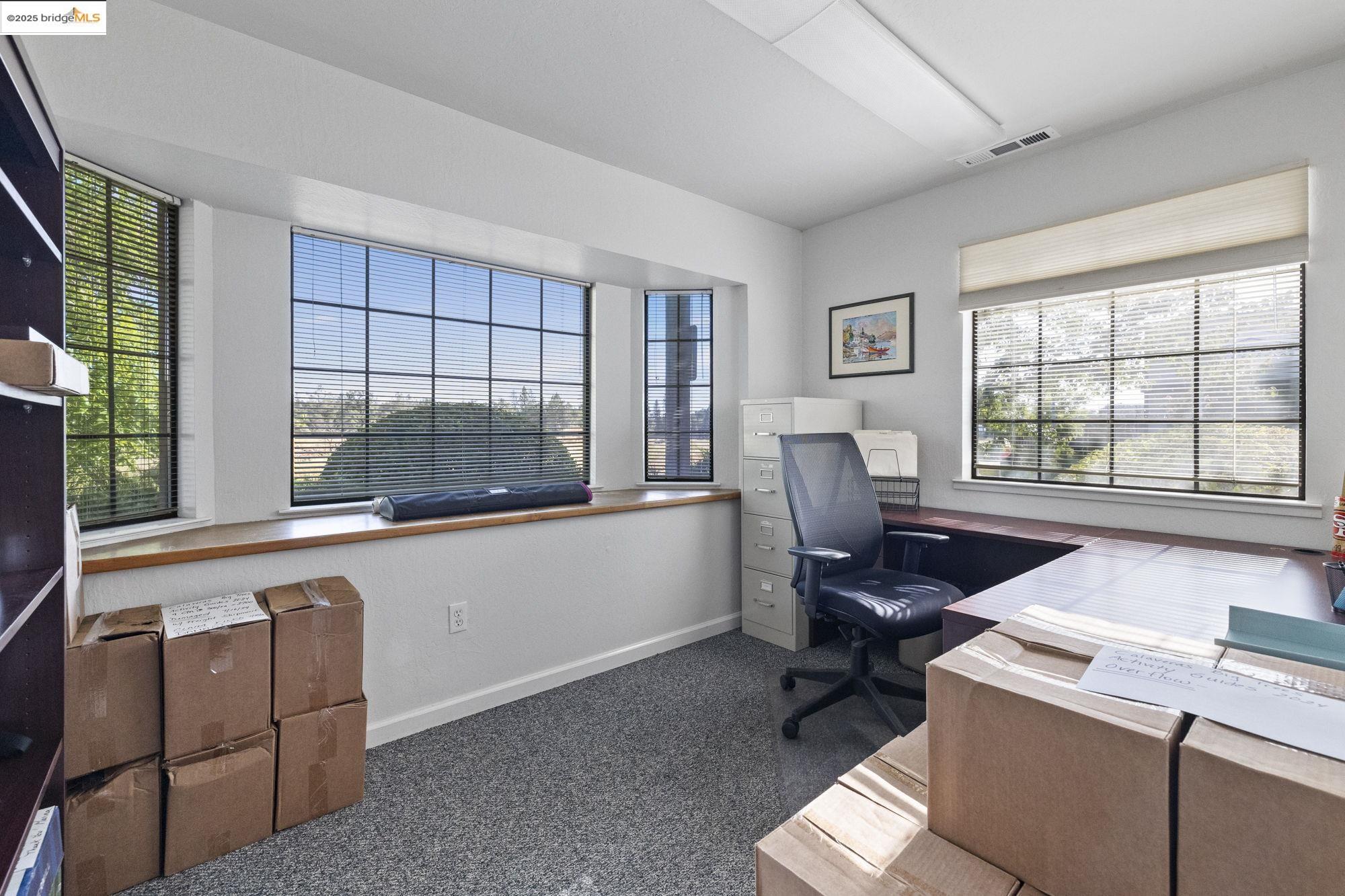 21663 Brian Lane Sonora, CA 95370 - Photo 5 of 9 a kitchen with a chair and appliances