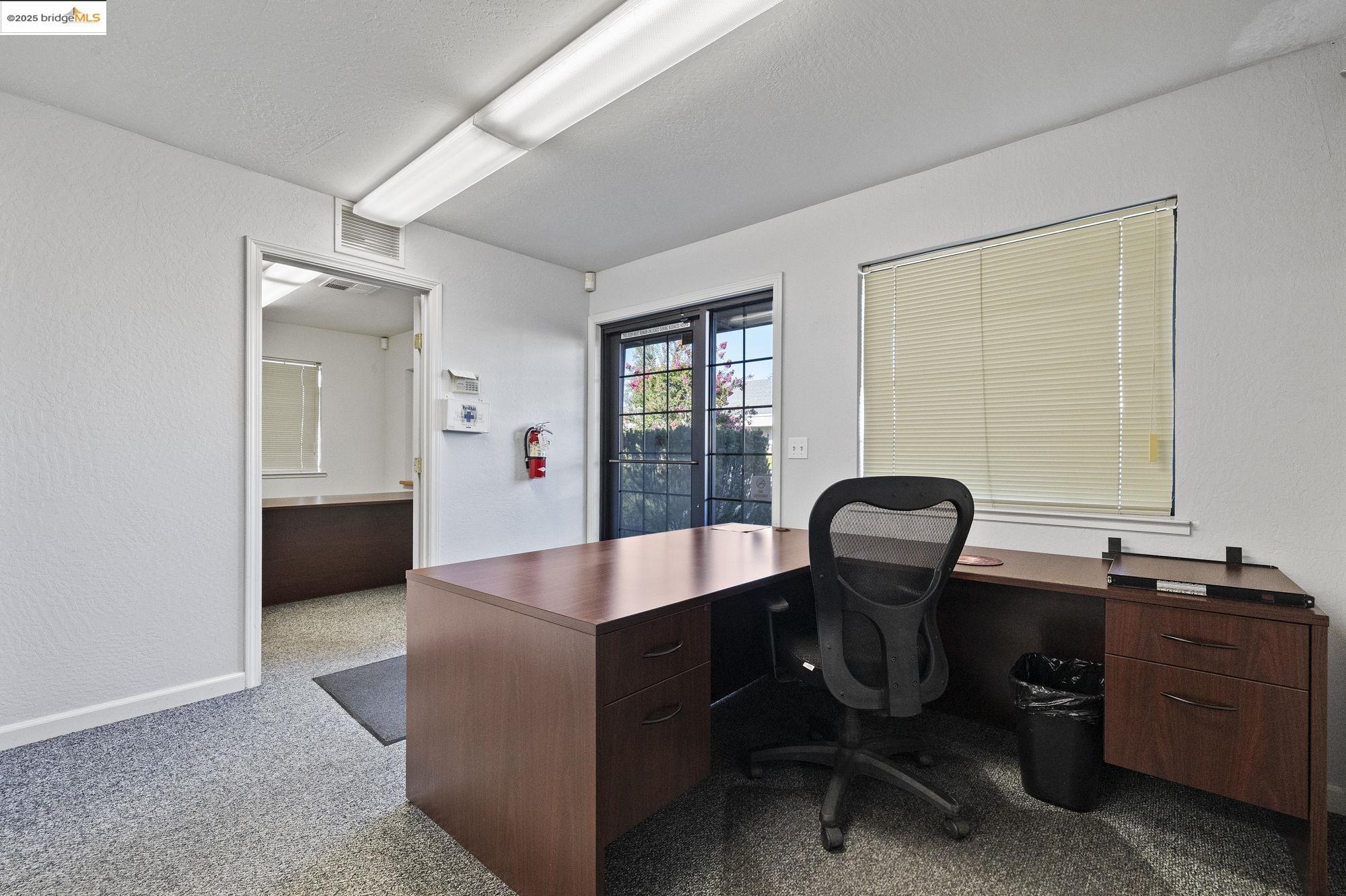 21663 Brian Lane Sonora, CA 95370 - Photo 7 of 9 a view of a workspace with furniture and a window