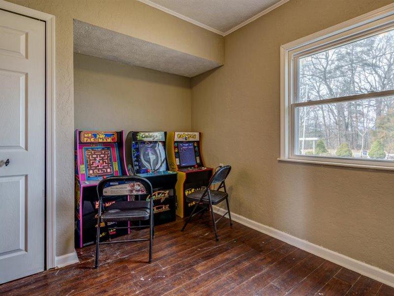 2331 Callaway Road Rocky Mount, VA 24151 - Photo 11 of 26 a view of a workspace with furniture and wooden floor