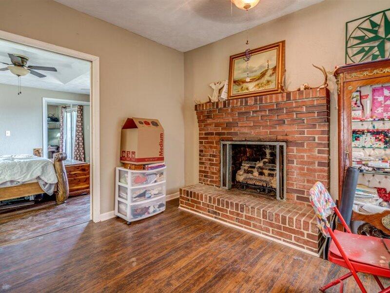 2331 Callaway Road Rocky Mount, VA 24151 - Photo 16 of 26 a living room with furniture and a fireplace