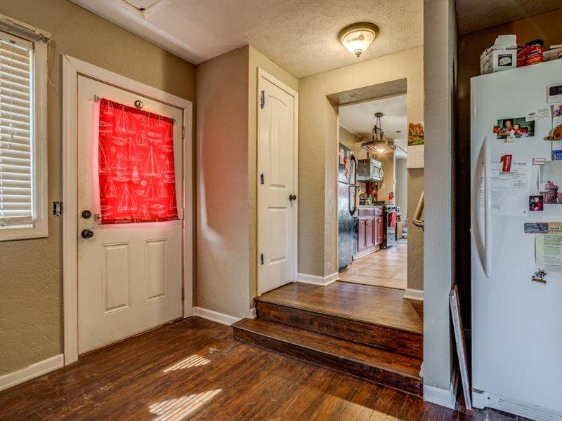 2331 Callaway Road Rocky Mount, VA 24151 - Photo 17 of 26 a view of a hallway with wooden floor and windows