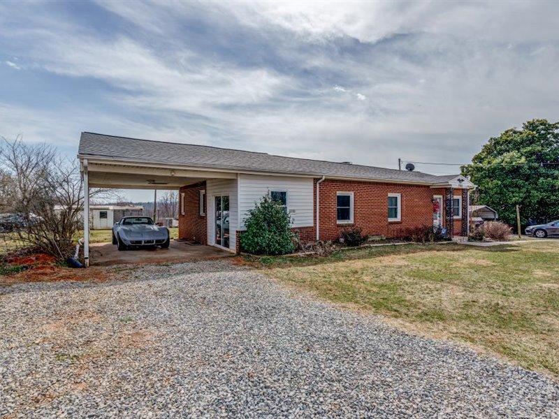 2331 Callaway Road Rocky Mount, VA 24151 - Photo 3 of 26 a view of a house with a yard