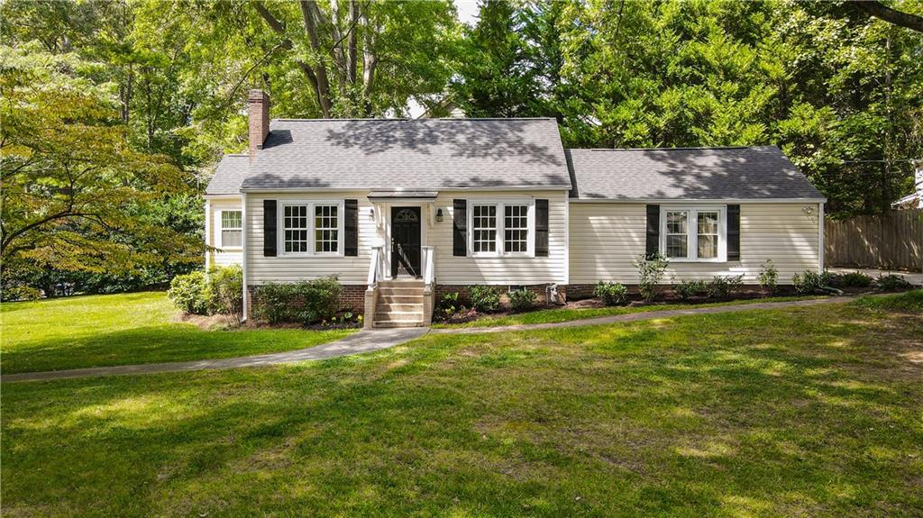 3494 Briarcliff Road Northeast Atlanta, GA 30345 - Photo 1 of 46 front view of a house with a yard