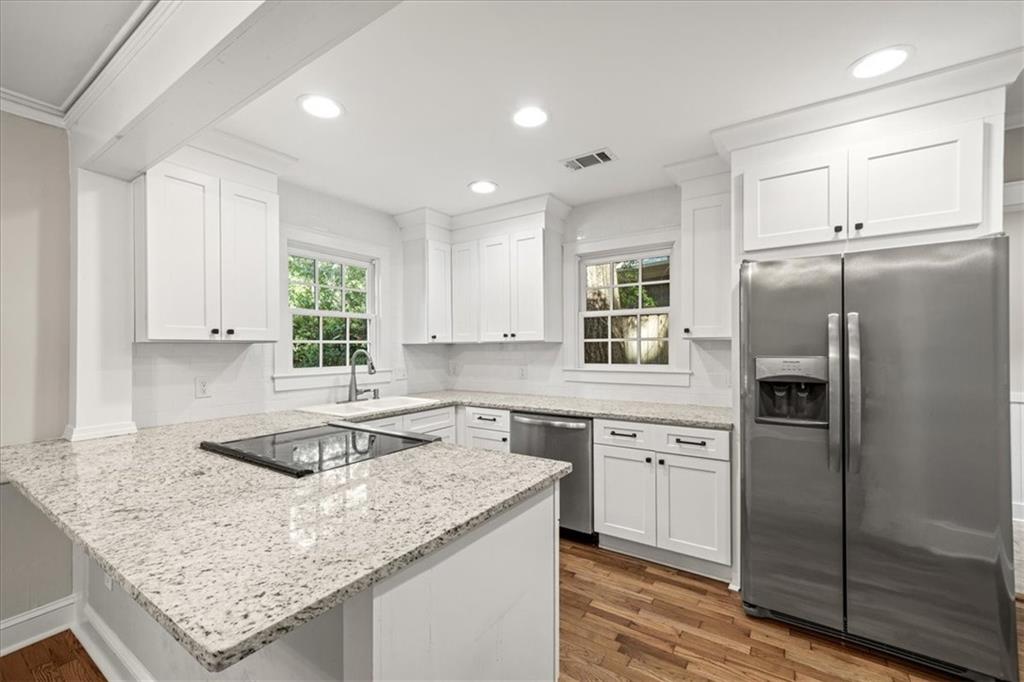 3494 Briarcliff Road Northeast Atlanta, GA 30345 - Photo 16 of 46 a kitchen with a sink stove and refrigerator