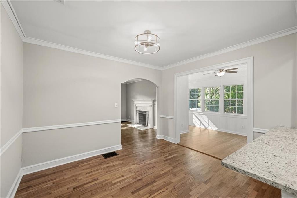 3494 Briarcliff Road Northeast Atlanta, GA 30345 - Photo 18 of 46 a view of empty room with wooden floor and fan