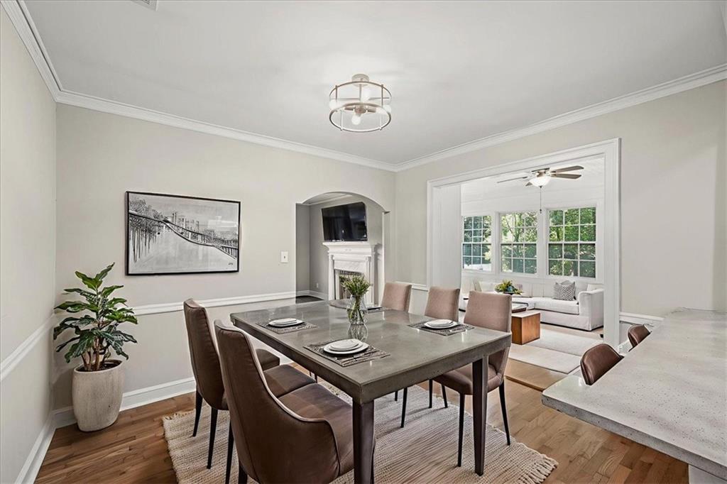 3494 Briarcliff Road Northeast Atlanta, GA 30345 - Photo 19 of 46 a view of a dining room with furniture window and wooden floor