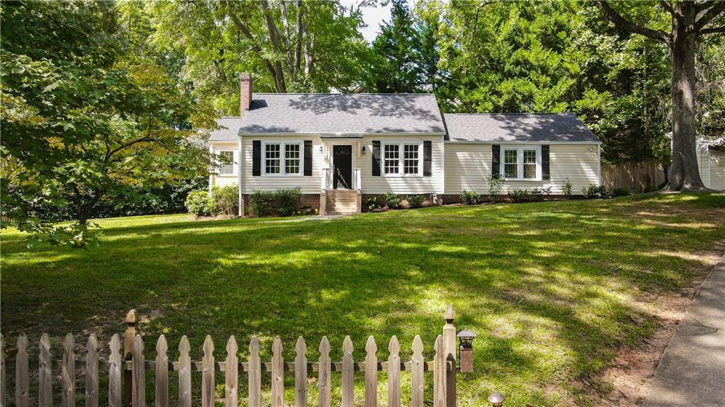 3494 Briarcliff Road Northeast Atlanta, GA 30345 - Photo 2 of 46 a front view of a house with a garden