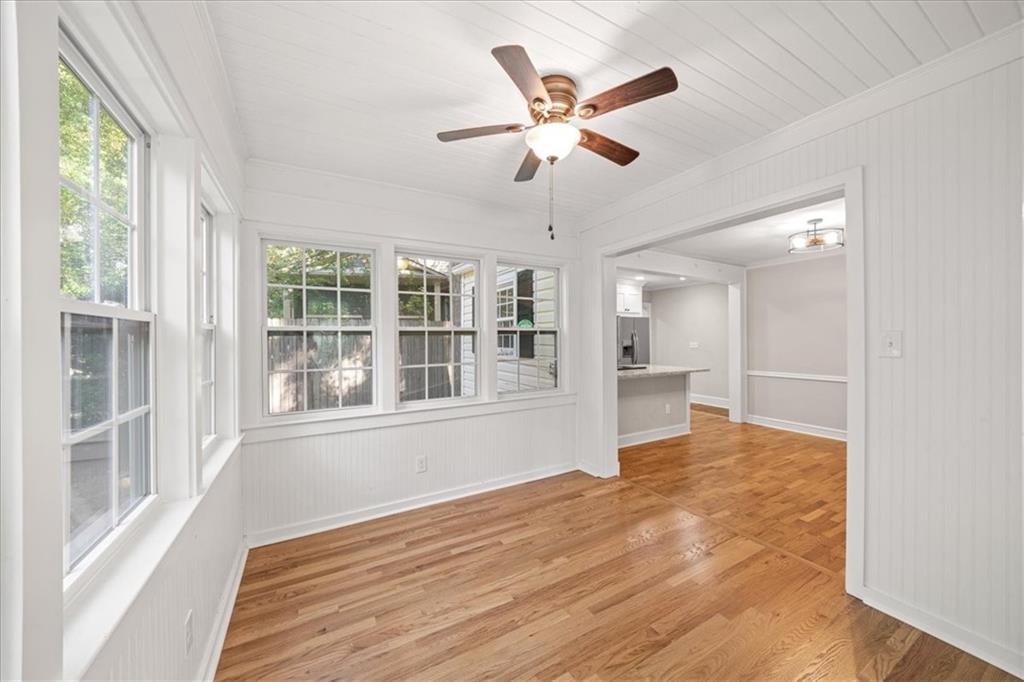 3494 Briarcliff Road Northeast Atlanta, GA 30345 - Photo 22 of 46 a view of an empty room with wooden floor and a window