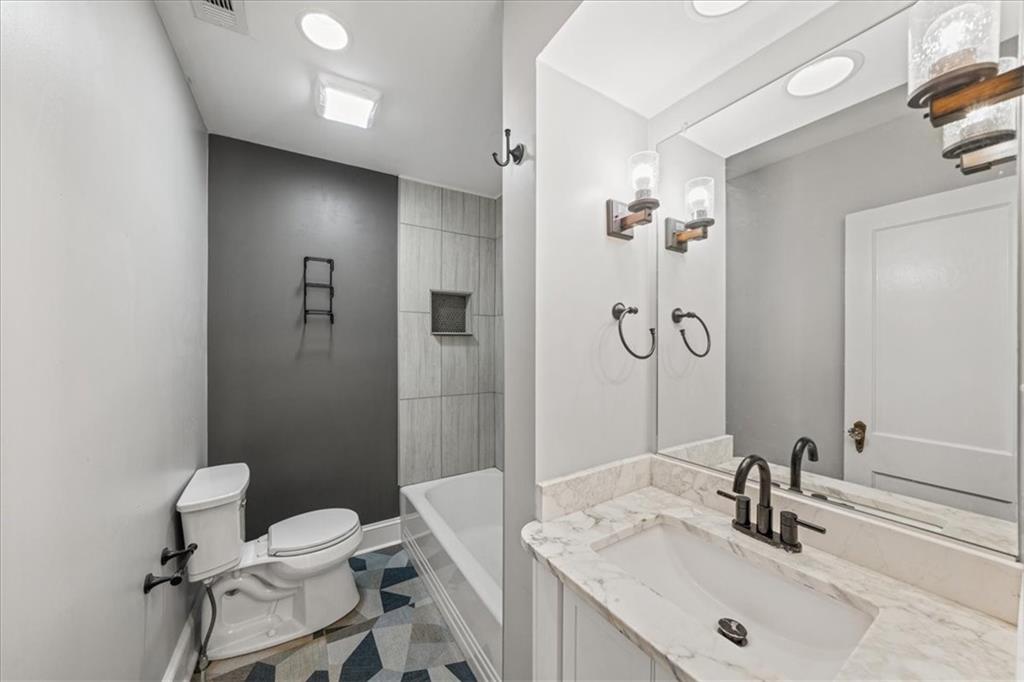 3494 Briarcliff Road Northeast Atlanta, GA 30345 - Photo 23 of 46 a bathroom with a sink and a mirror